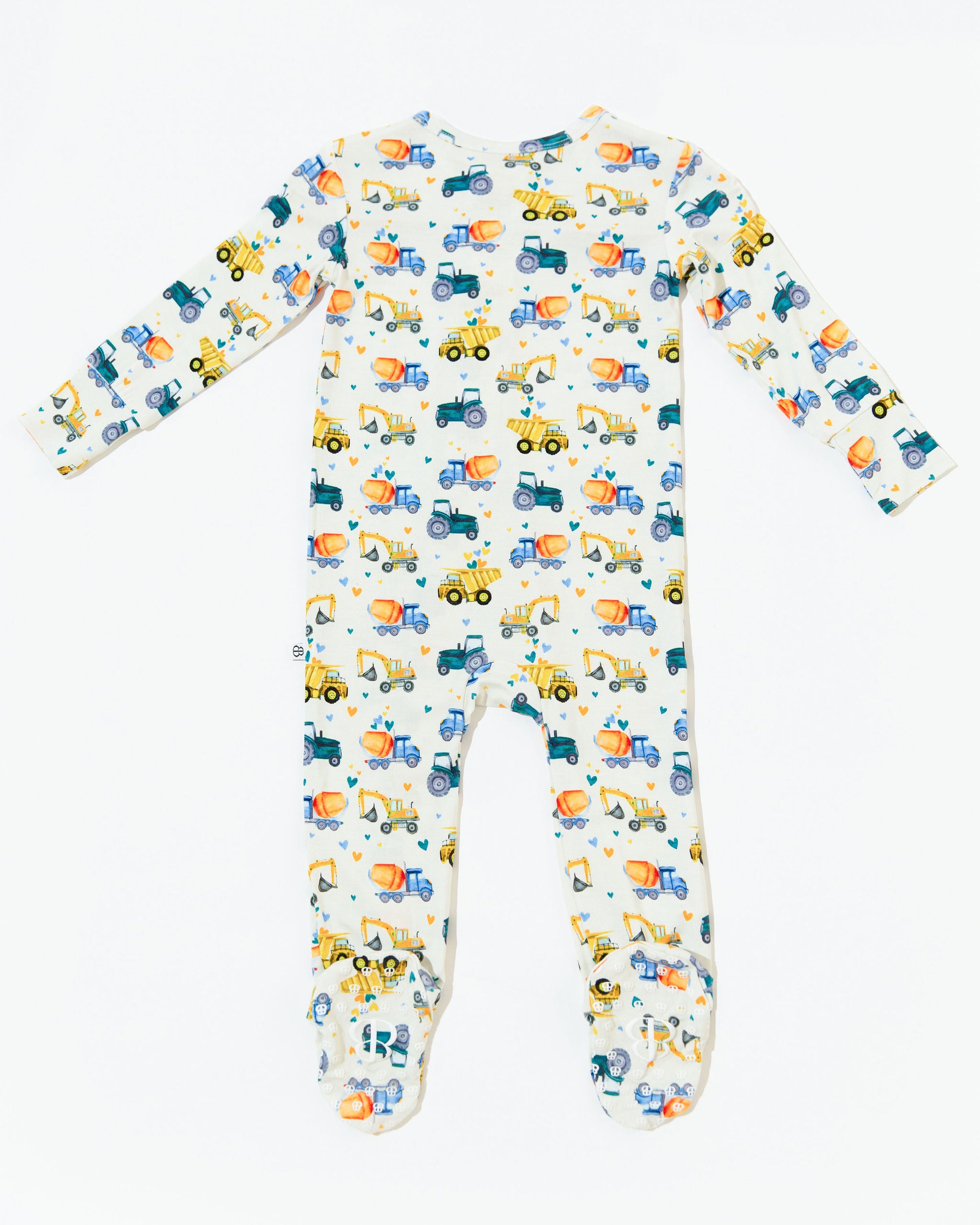 zoomed out back of truckin along onesie